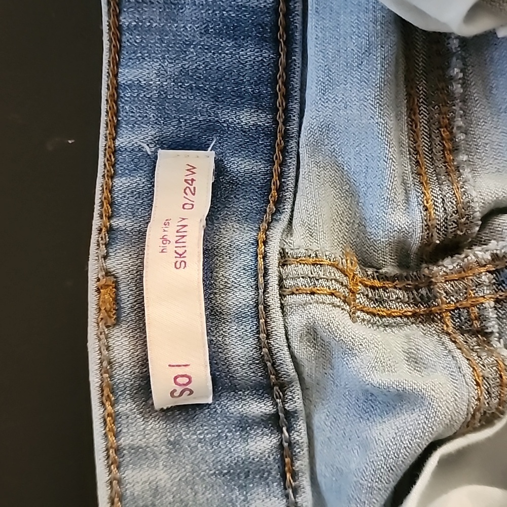 Light Wash Ripped Skinny Jeans
